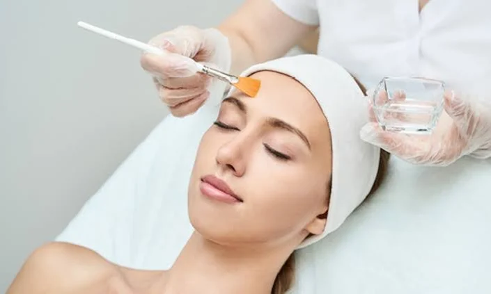 Chemical peel solution being applied with a brush at Beyond Beauty Skin, Laser and Aesthetic Clinic, Vehari