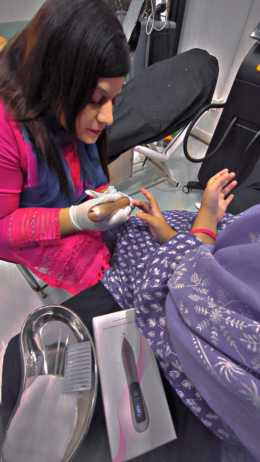 Dr. Bareera Performing Microneedling